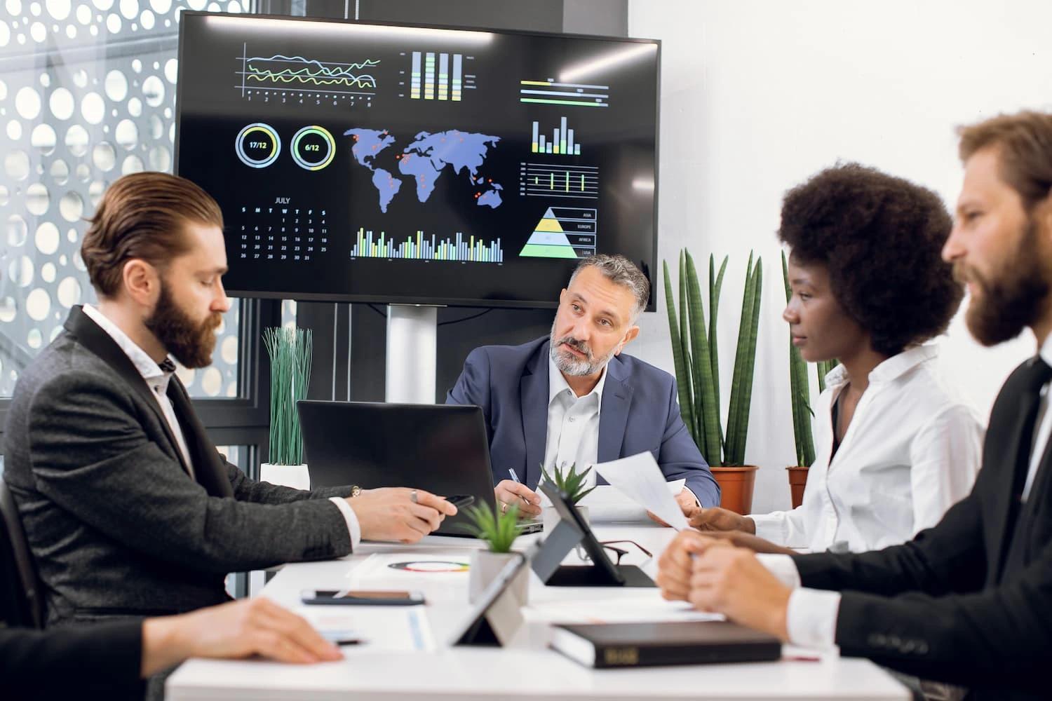 group-of-smart discussing arounf Data & AI Governance at ELCA