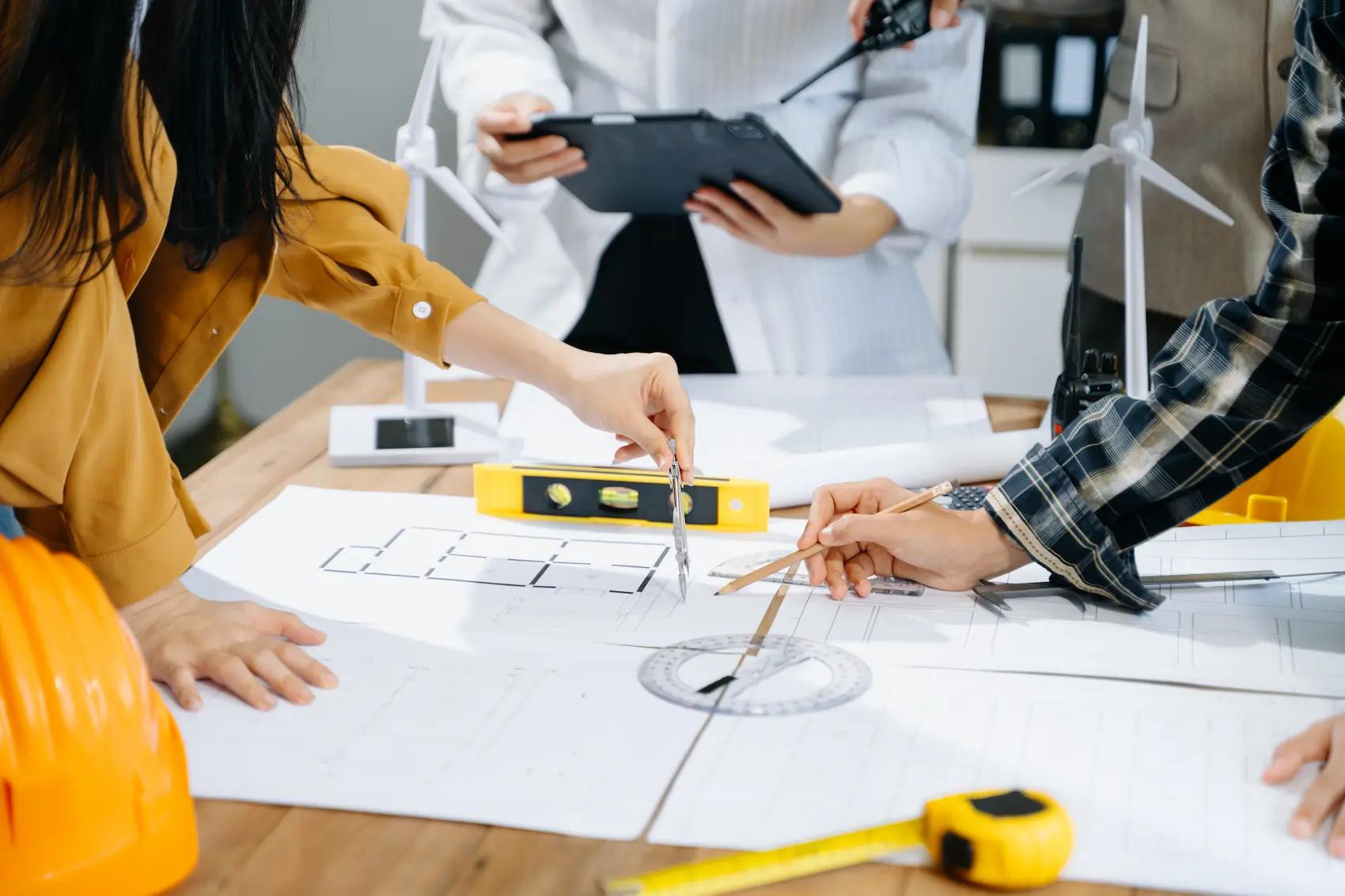 creative-architect-projecting-on-the-big-drawings