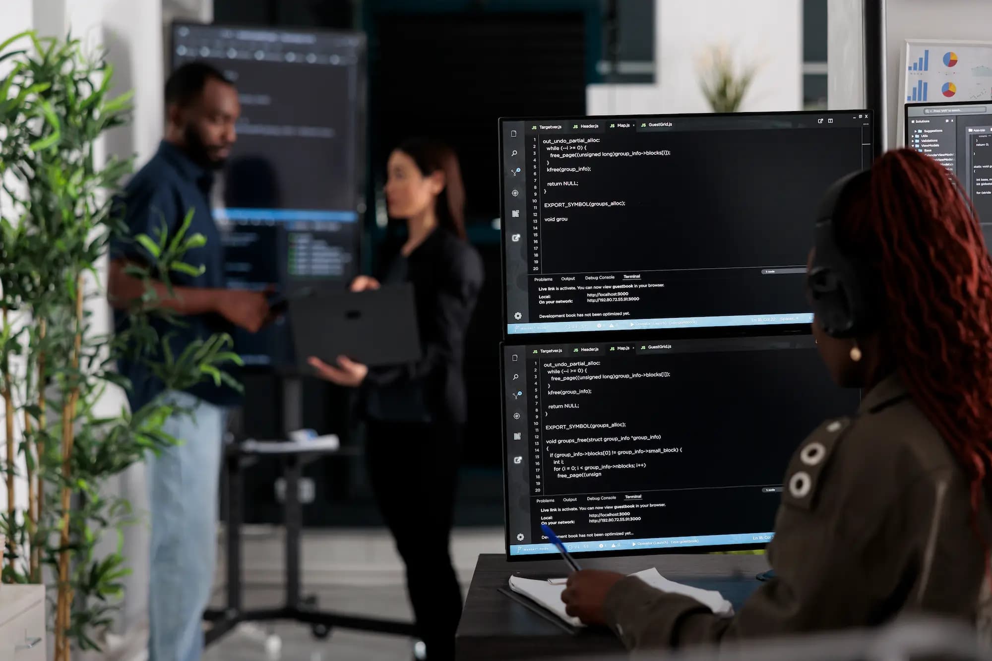 Software engineers developing custom enterprise business applications using AI-powered engineering